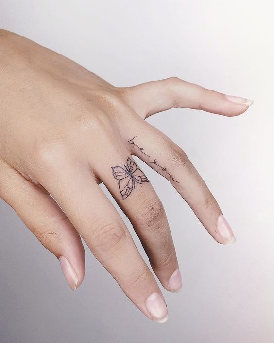 Butterfly tattoo on fingger 2