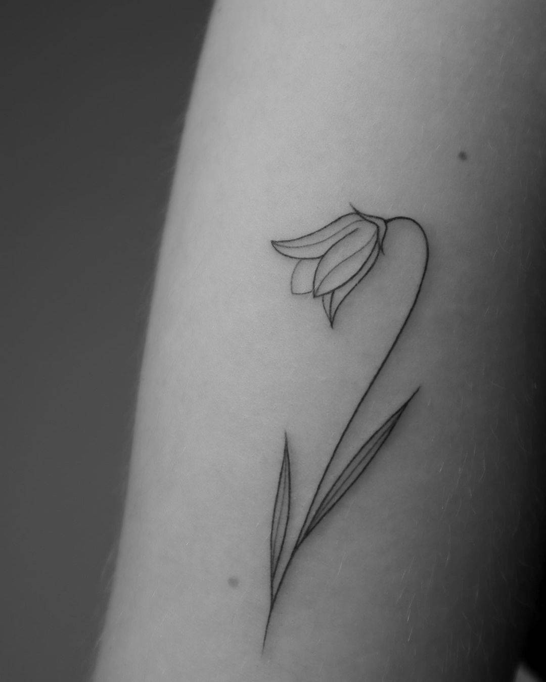 Fineline flower tattoo by janapadar