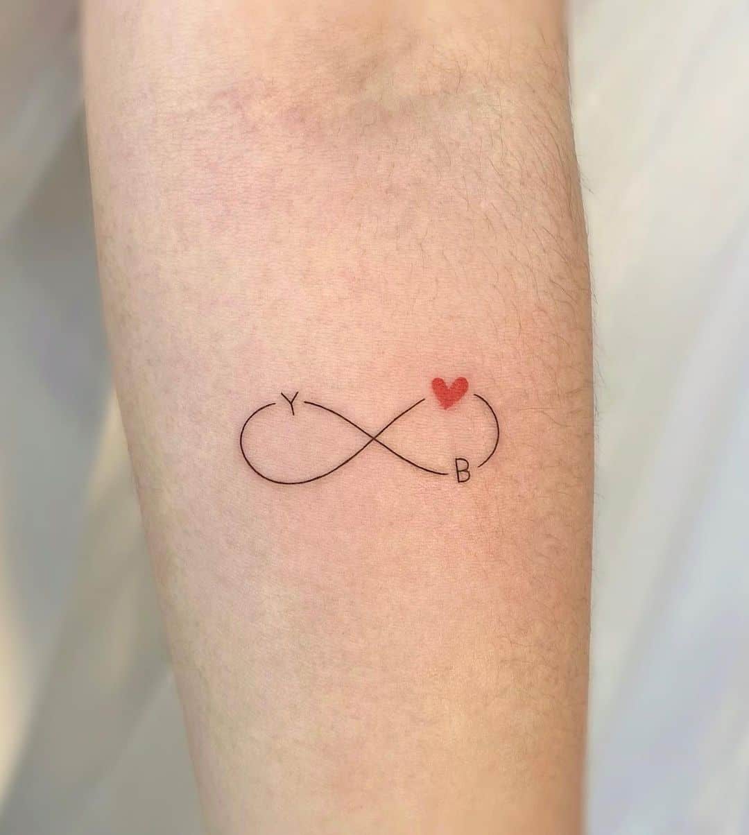 Fineline infinity tattoo by tattooist neul
