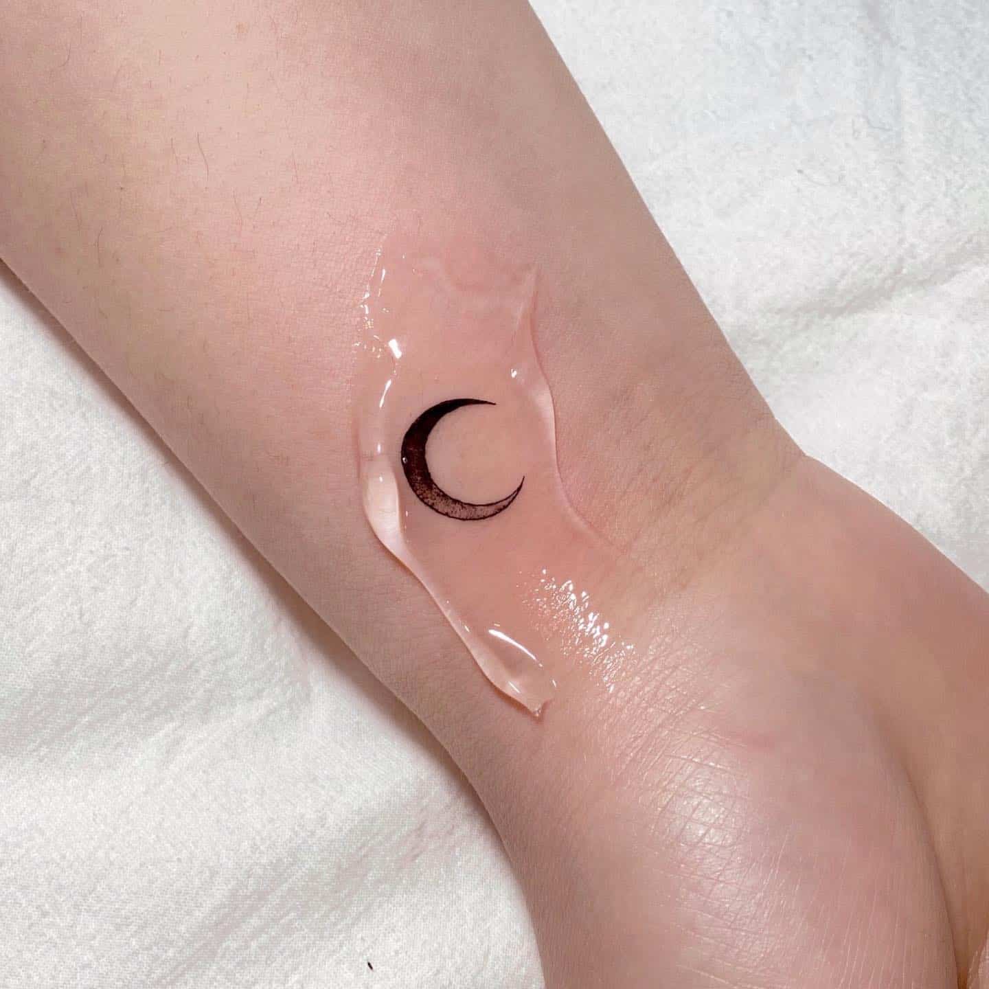 Fineline moon tattoo by jjun tattoo