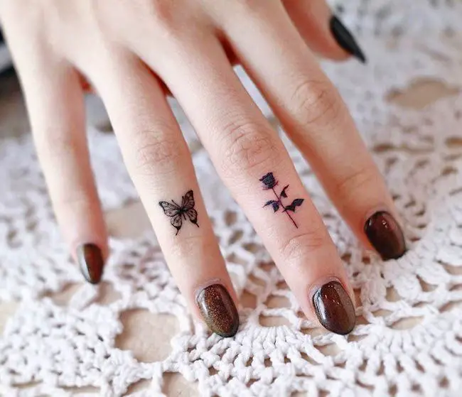 Flower tattoo on finger 4
