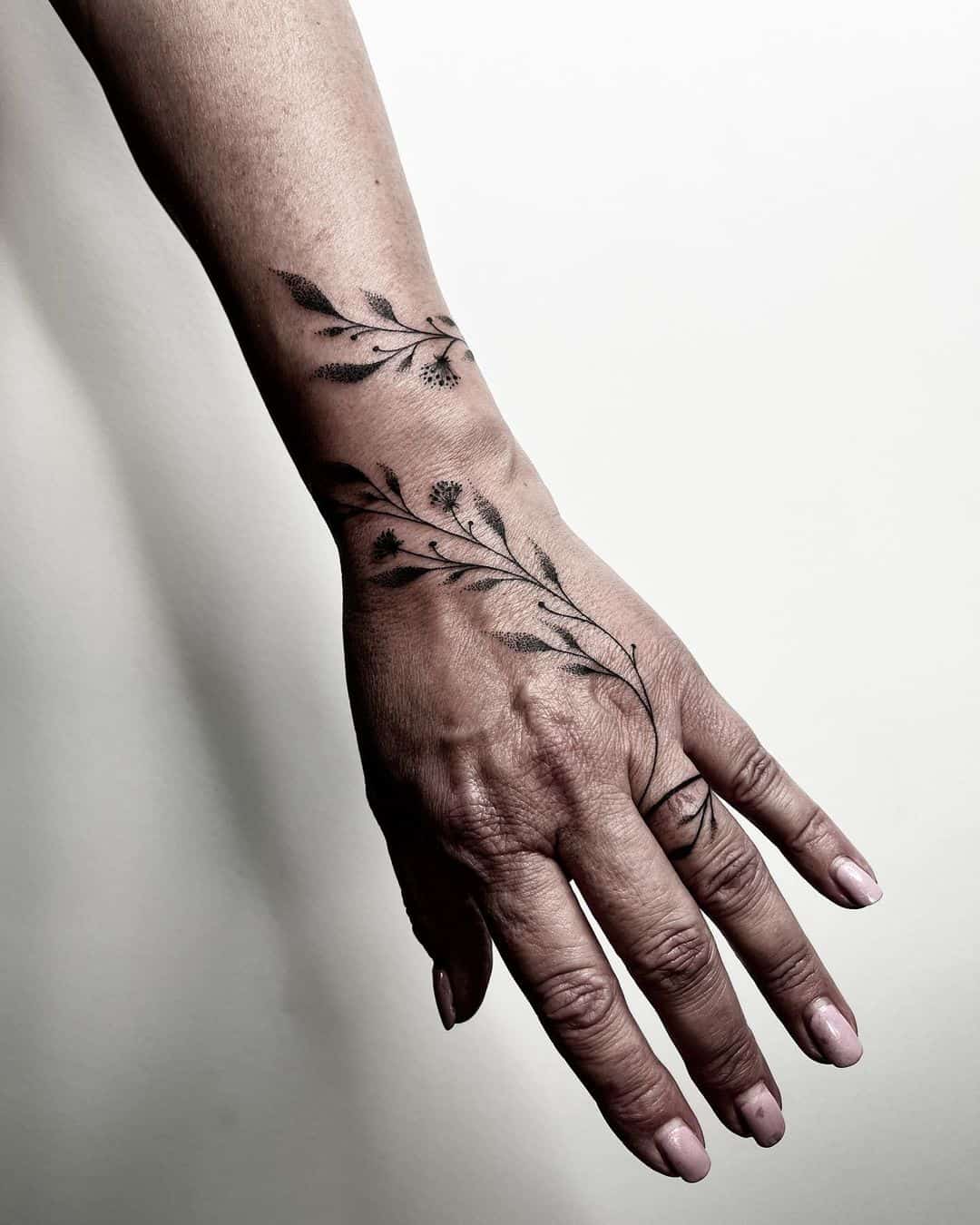 Leaf finger tattoo by lisa.li tattoo