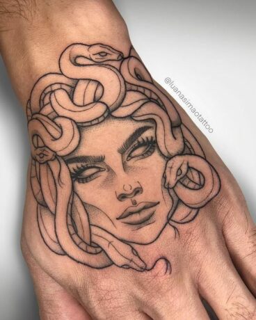 Medusa hand tattoo 1
