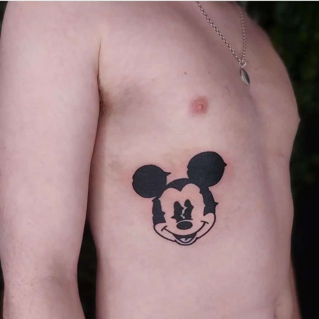 Mickey mouse tattoo by guanandpedaltattoostudio