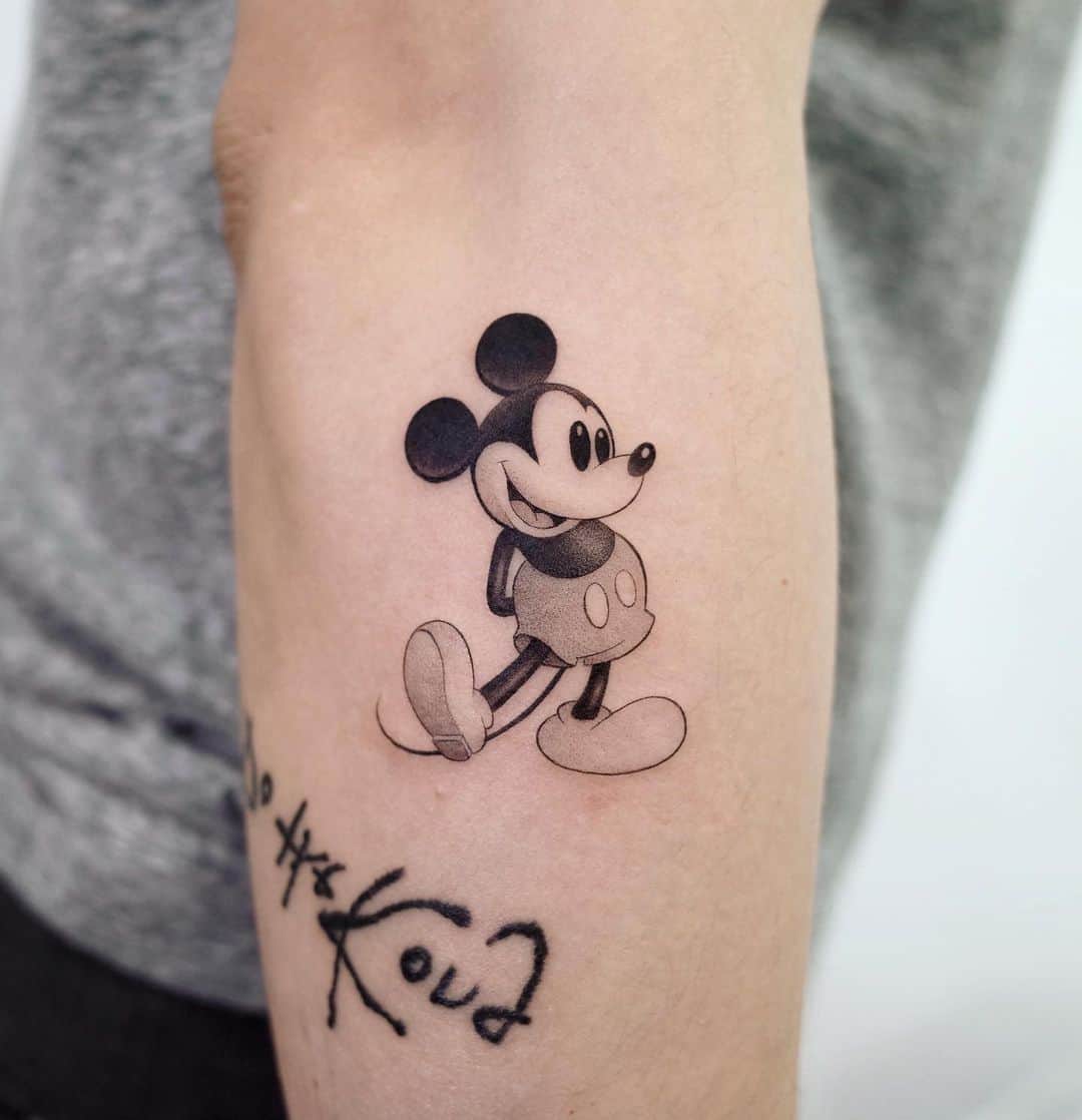 Mockey mouse tattoo by zeal tattoo