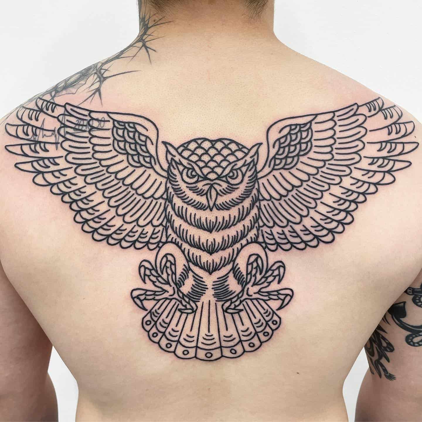 Owl tattoo by mamba tattooer