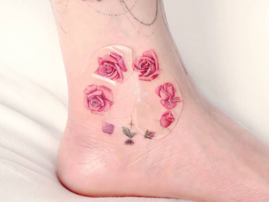 Pink rose on le by peria tattoo