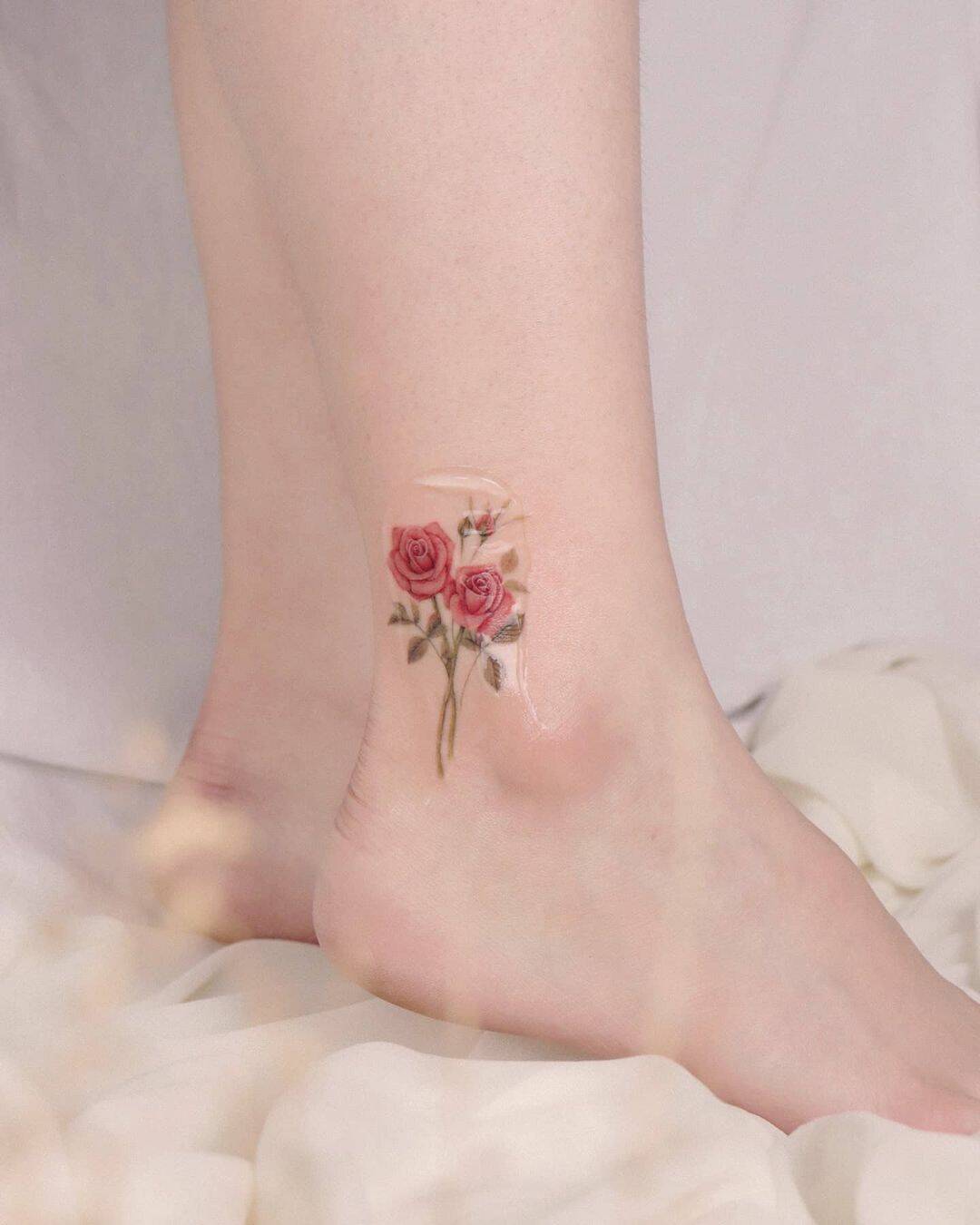 Pink rose tattoo by peria tattoo