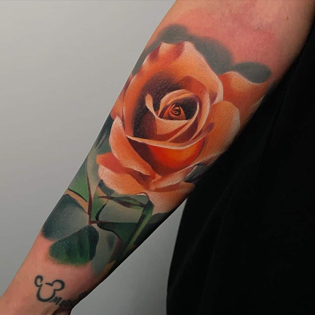 Realistic rose tattoo by kasz plumbaum tattoo