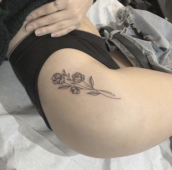 Rose tattoo on thigh 2