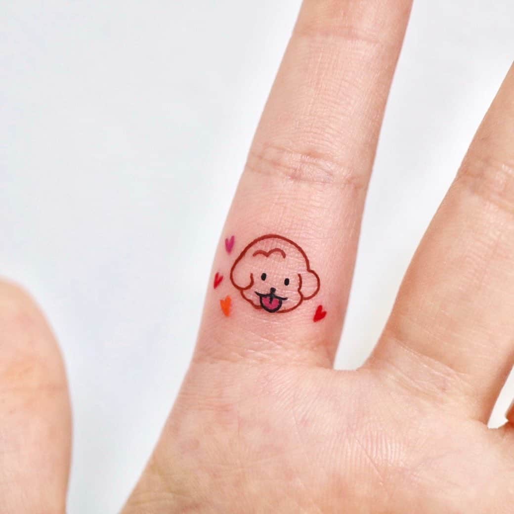 Small finger tattoo by soy tattoo