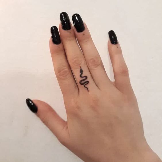 Snake tattoo on finger 2