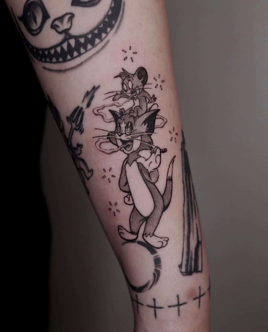 Tom and jerry tattoo by one million tattoos