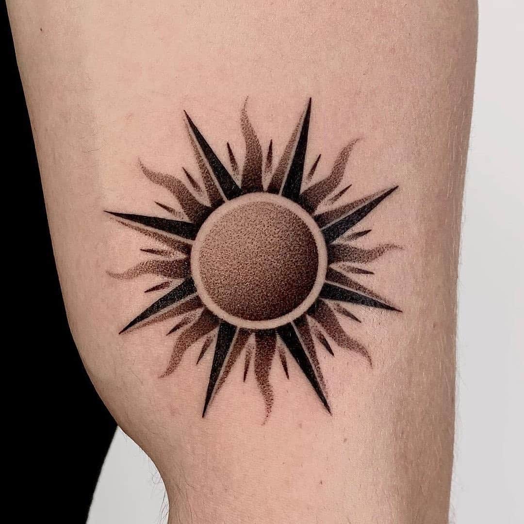 sun tattoo by foot servant