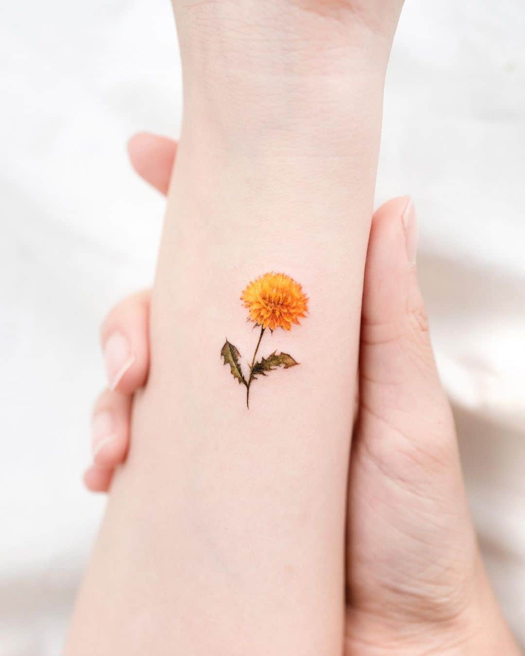 Dandelion tattoo by donghwa tattoo