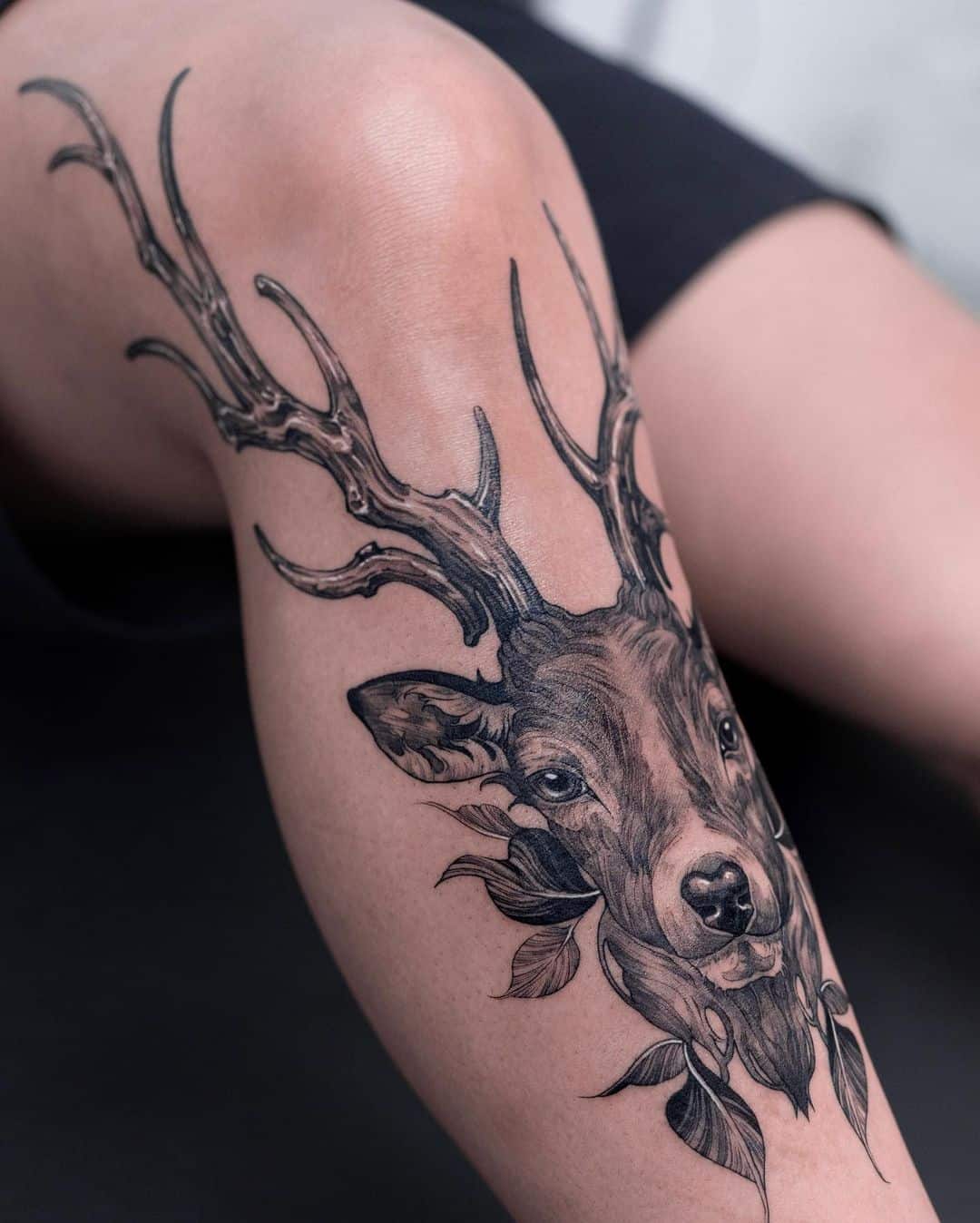 Black Ink Deer And Wolf Head Tattoo Design