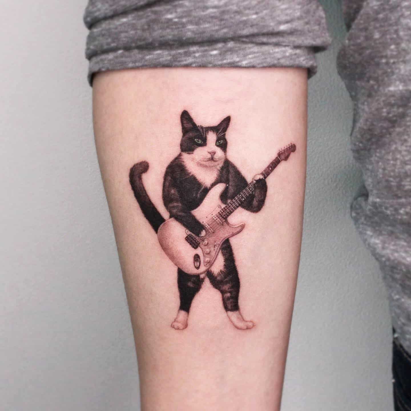 Guitar tattoo design by tattooist eheon