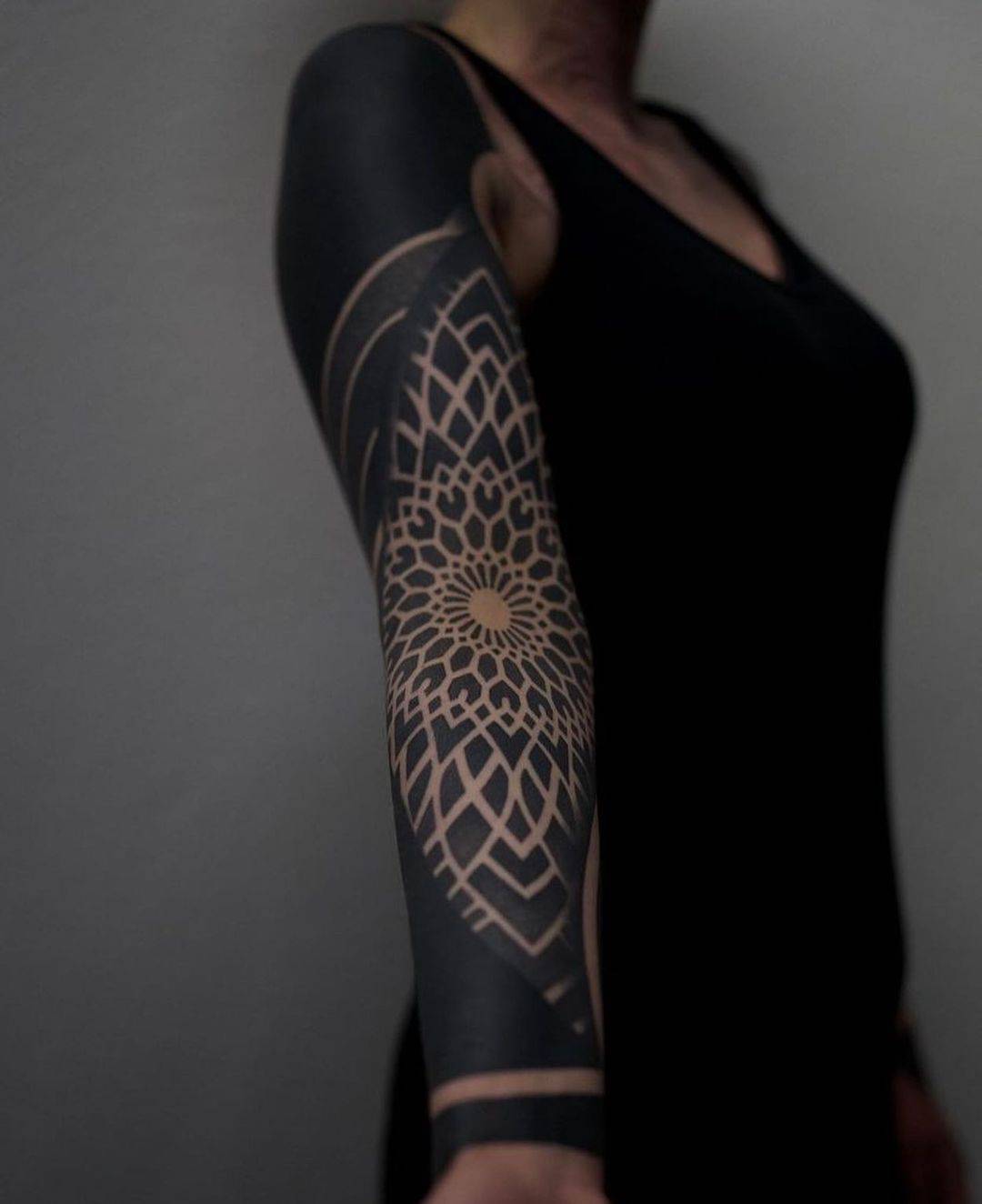 Mandala tattoo by blackwork company