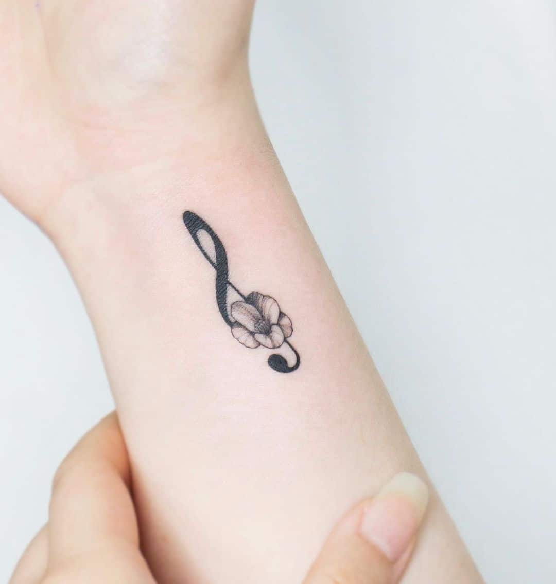 Music on wrist tattoo by choya tattoo