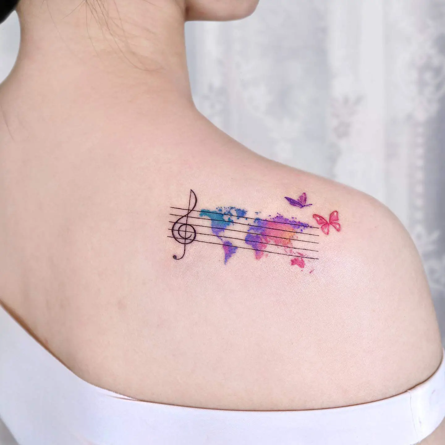 Music tattoo with butterfly by palette.tt