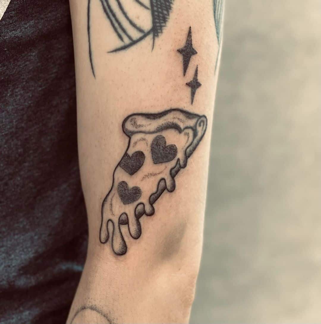 Pizza tattoo by sarahhowindtattoo