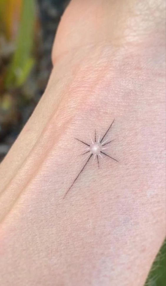 Simple star tattoo 2