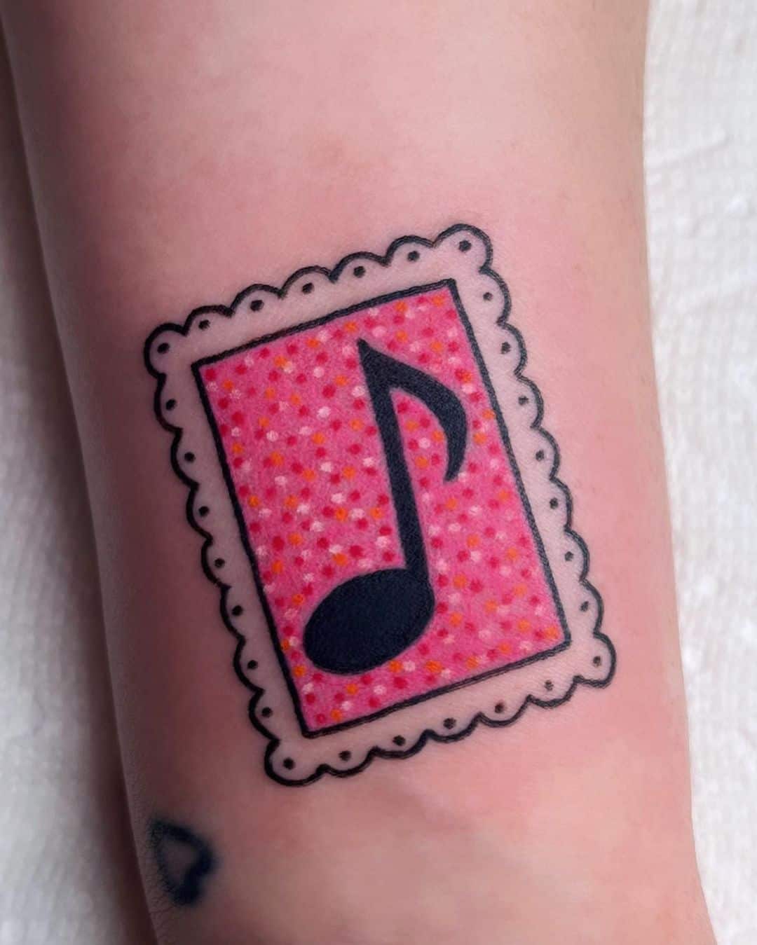 Unique music tattoo by