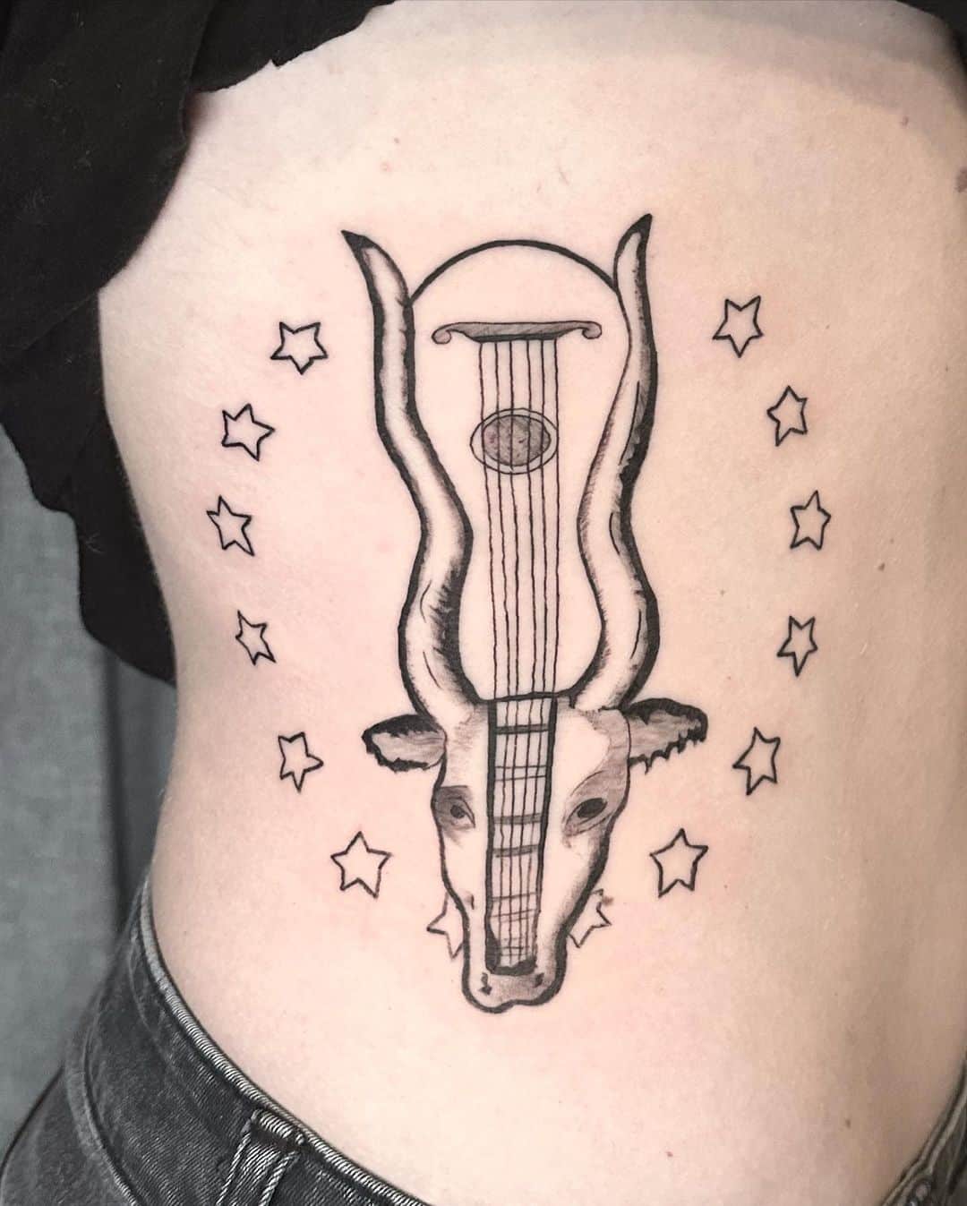 Unique music tattoo by laurids tattoo
