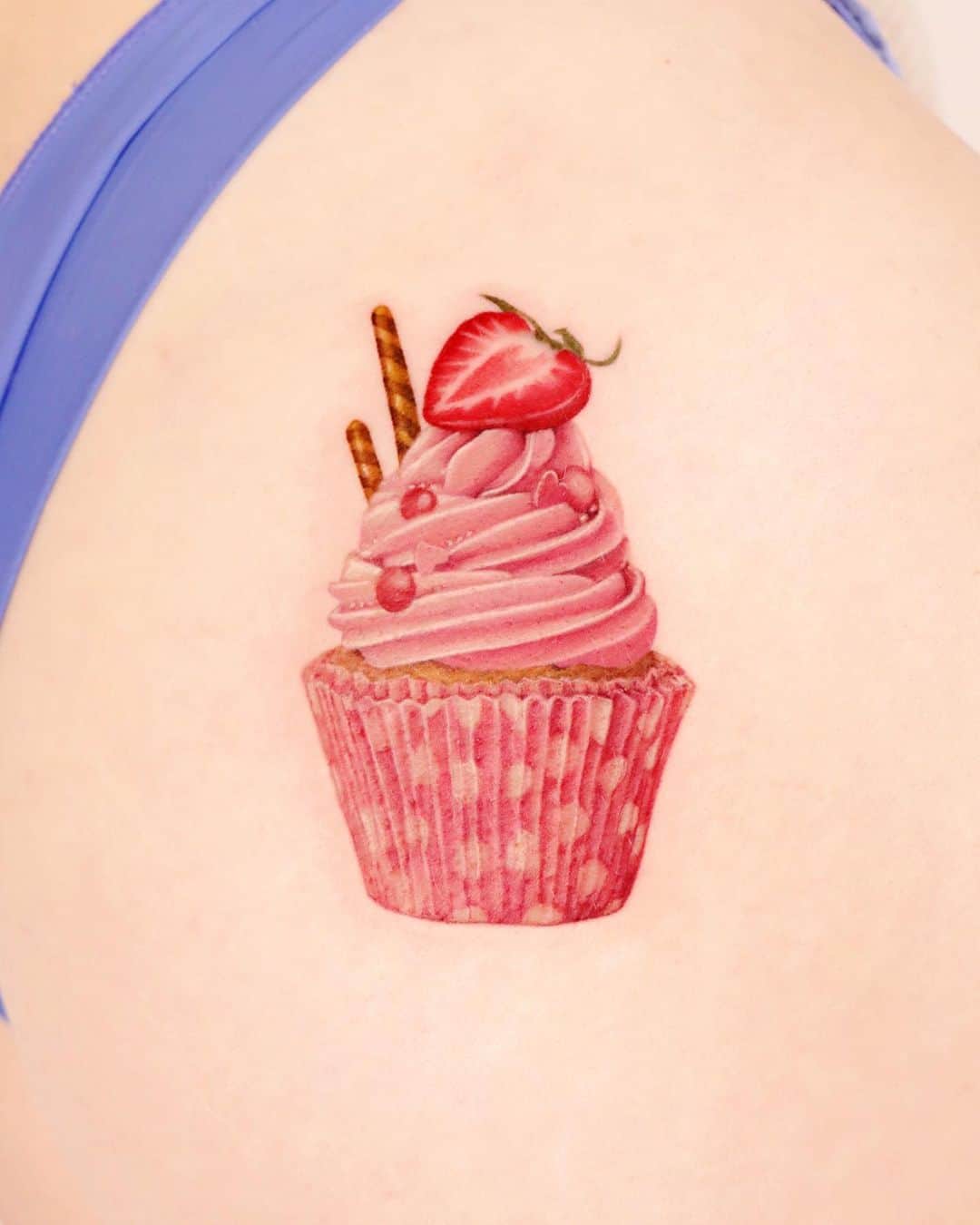 cupcake tattoo by peria tattoo