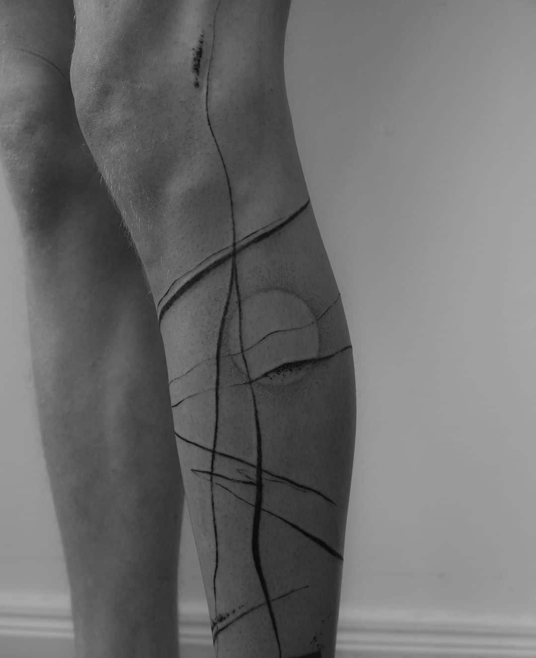 Abstract leg tattoo by dianaveidenthaler.ink