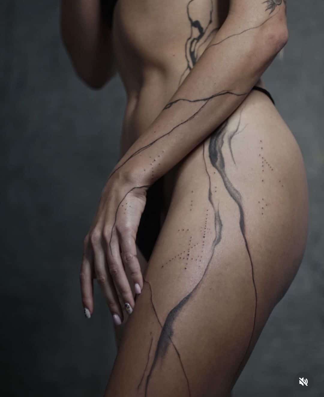 Abstract tattoos for women in leg by southcitymarket