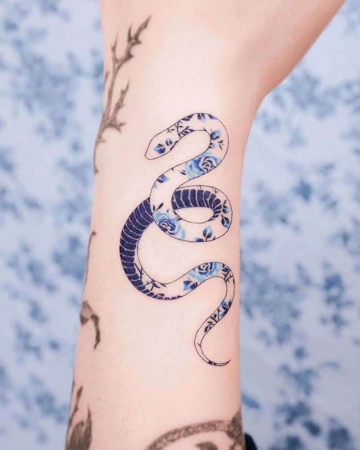 Cute snake tattoo 1