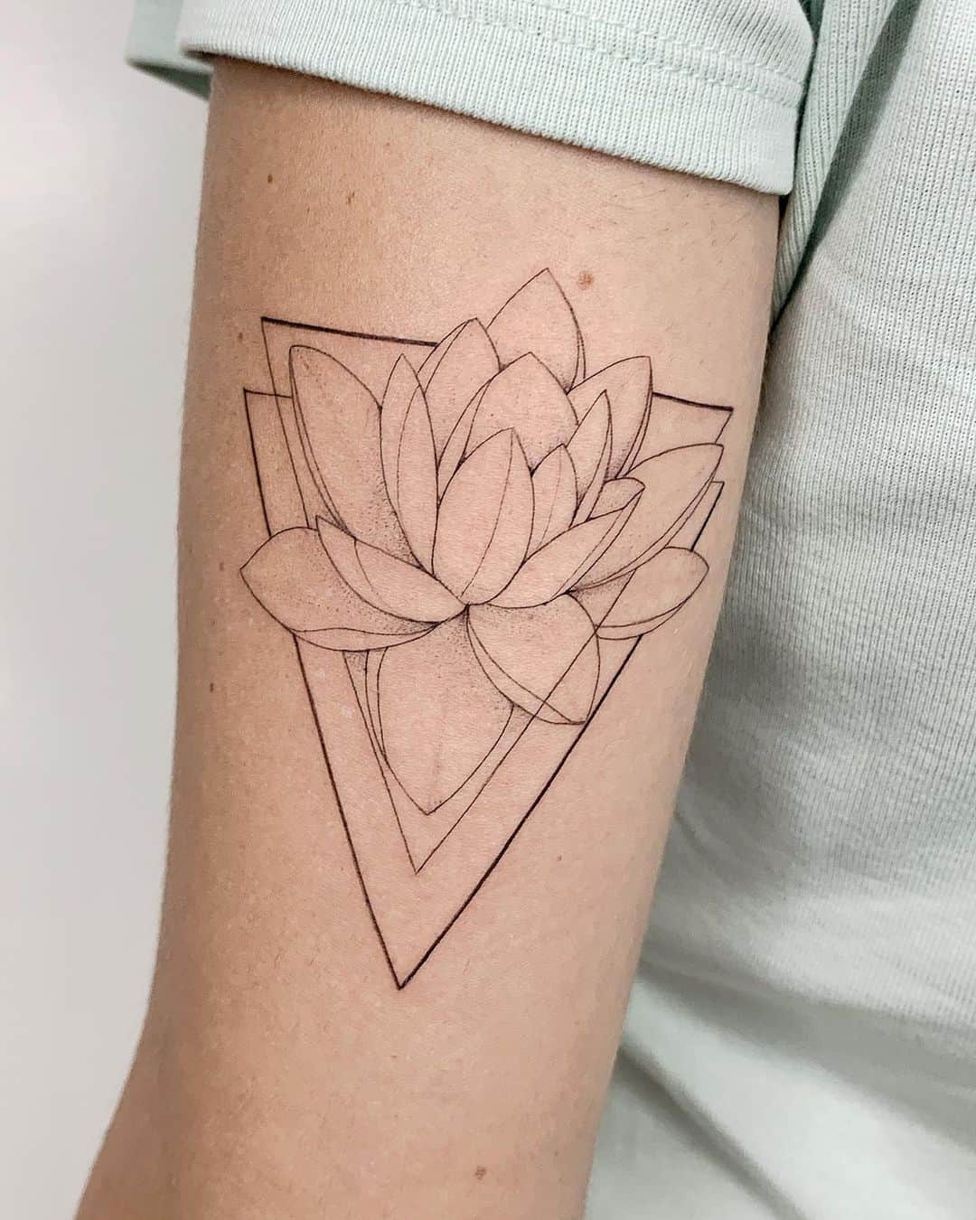 Geometric lotus tattoo by ricardo.di .paulla.tattoo