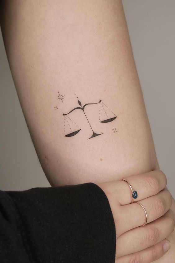 1,300+ Libra Tattoos Stock Photos, Pictures & Royalty-Free Images - iStock