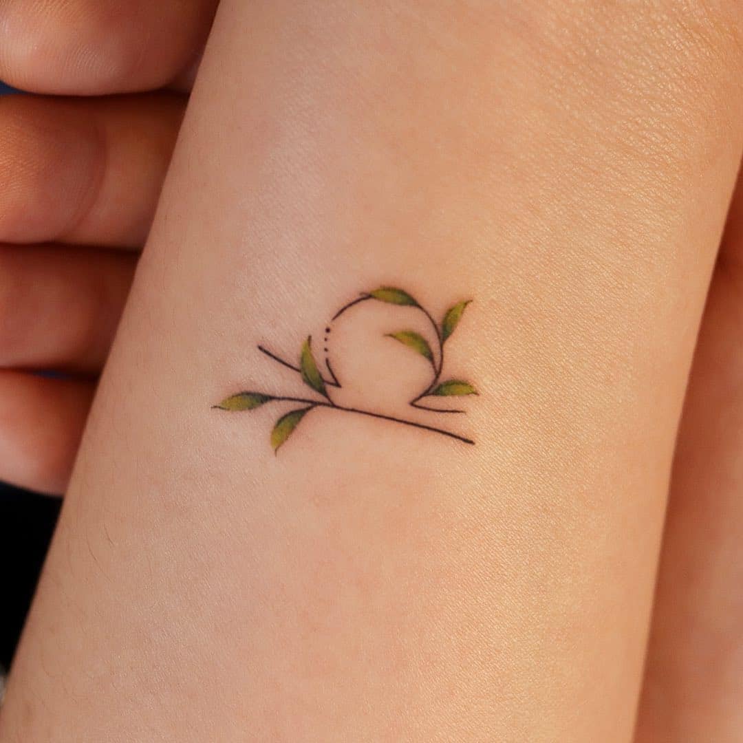 Flower Tattoo on Left Inner Arm