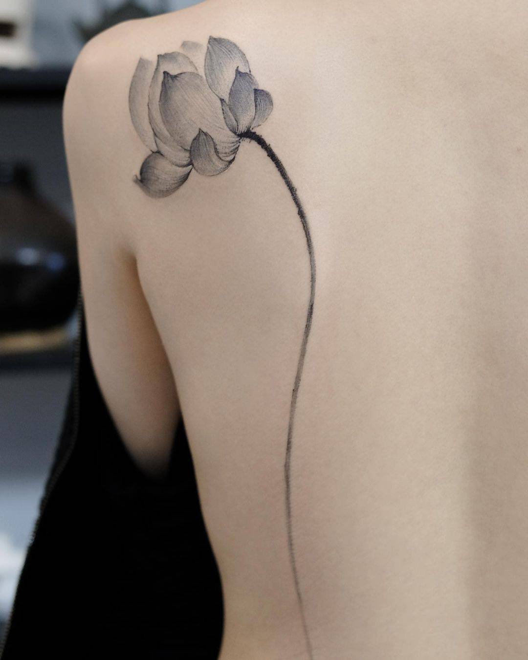 Lotus back tattoo by