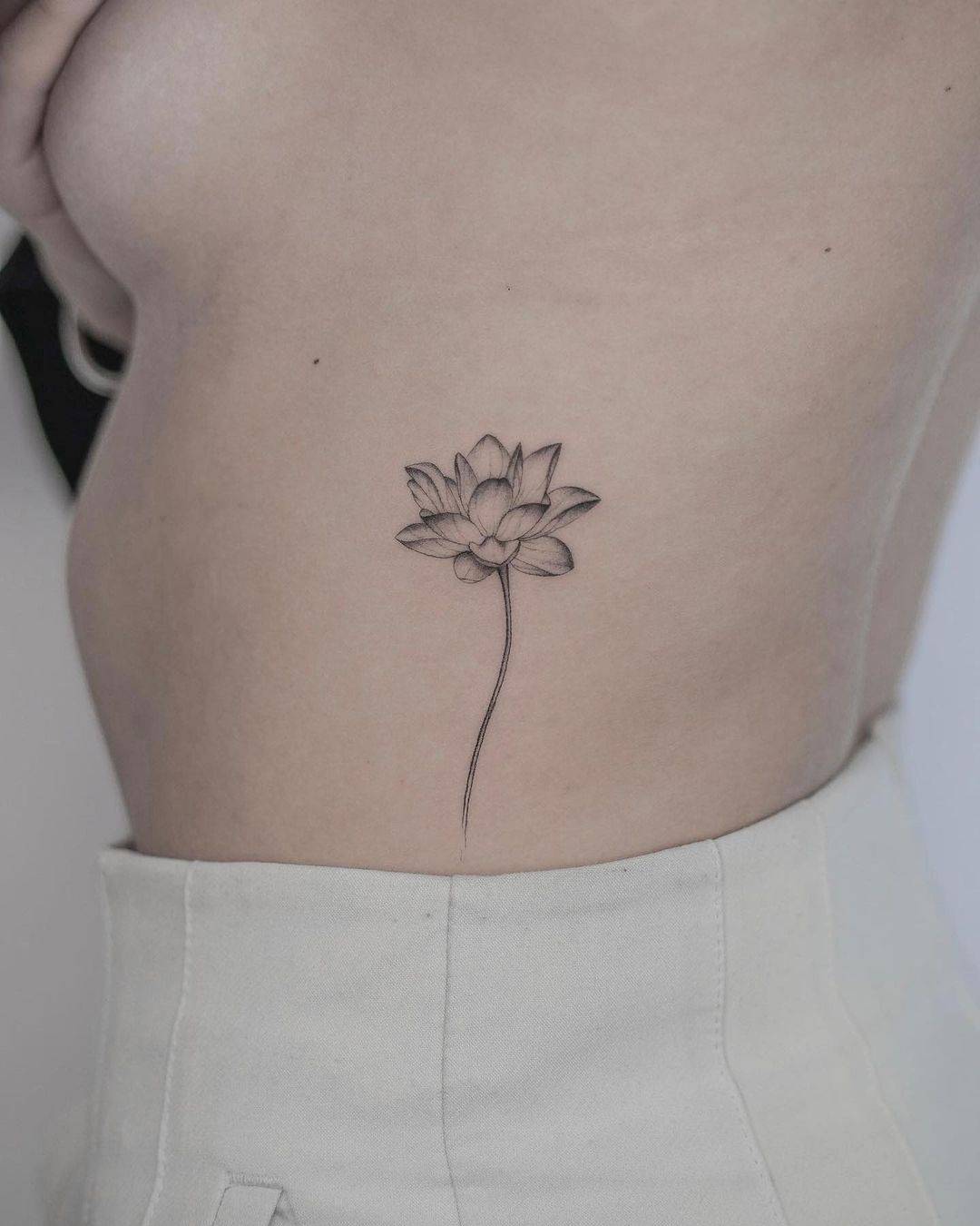 Lotus tattoo by tattooist veronika