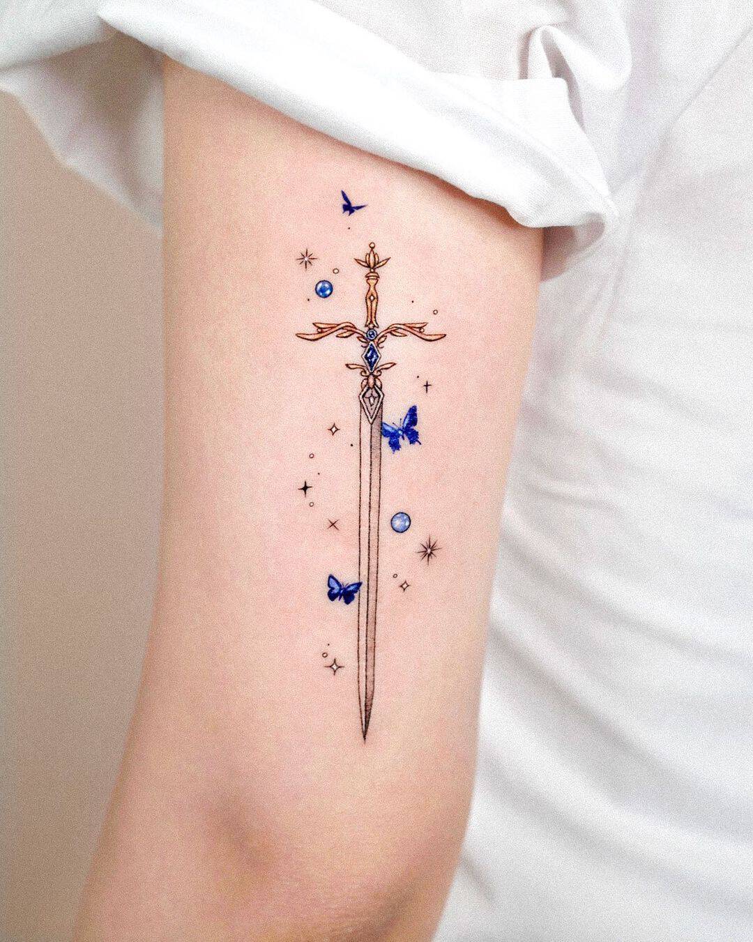 MInimalistic star tattoo by tattooist solar