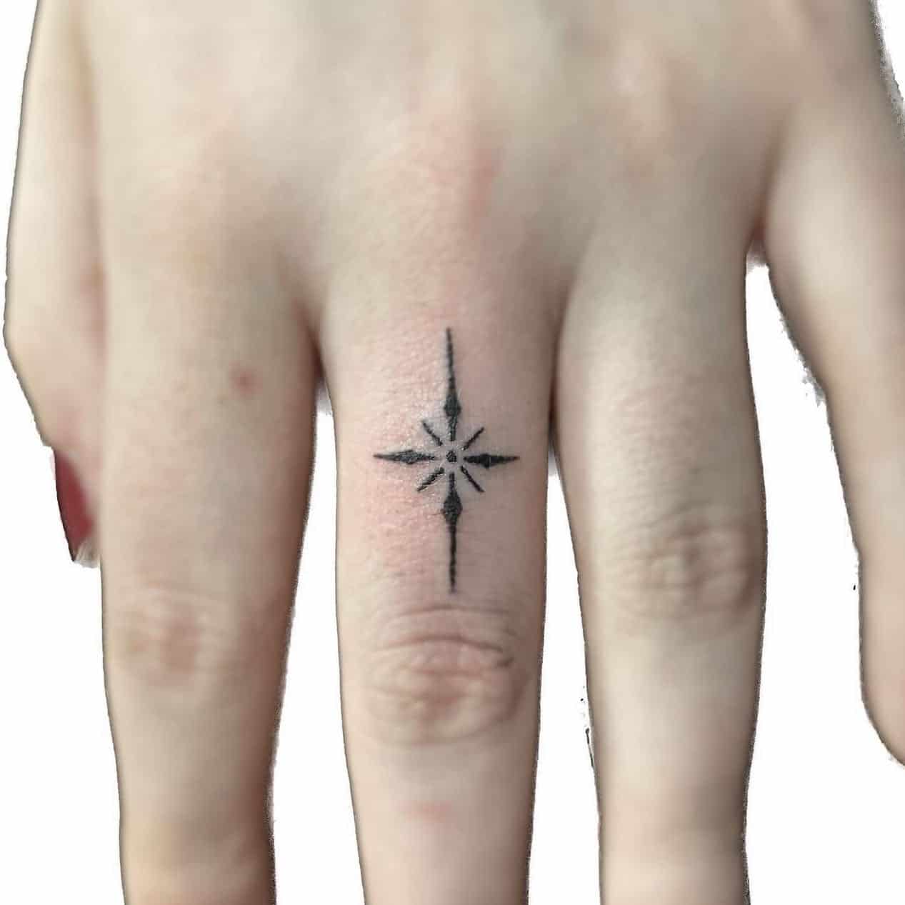 Minimalistic finger tattoo by darkatelier.tattoo
