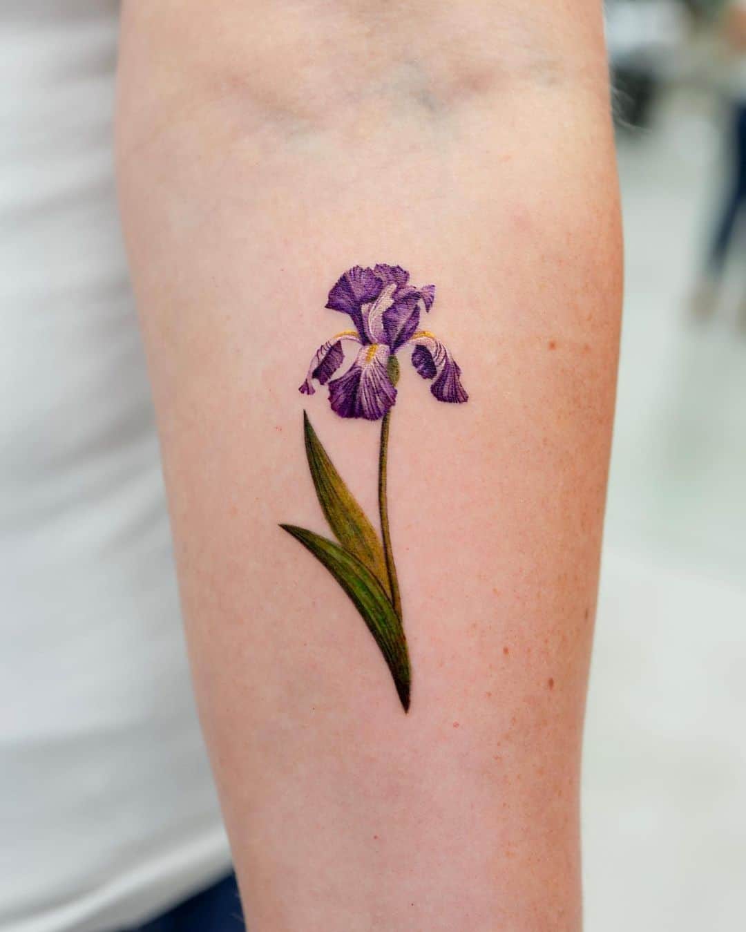Minimalistic flower tattoo design by rony tattoo