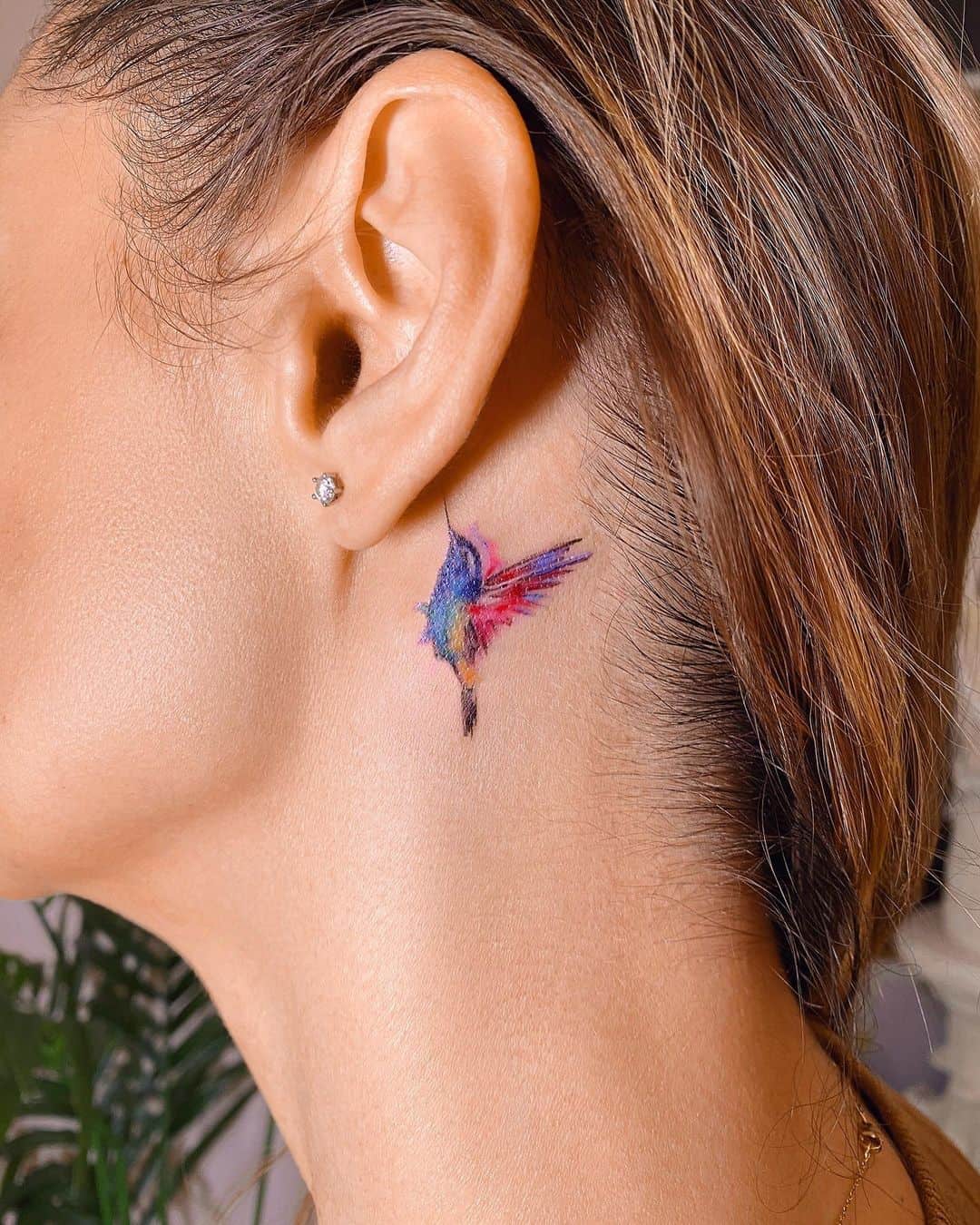 Minimalistic hummingbird tattoo by tattoo vesna prague