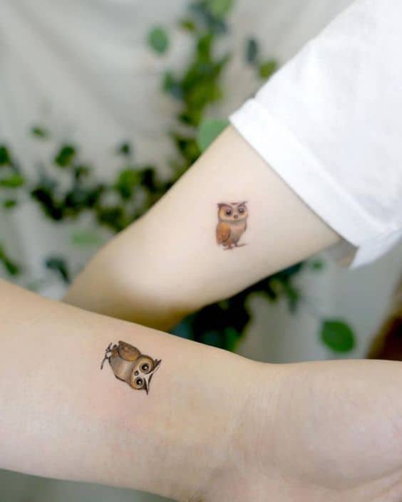 Minimalistic owl tattoo 1