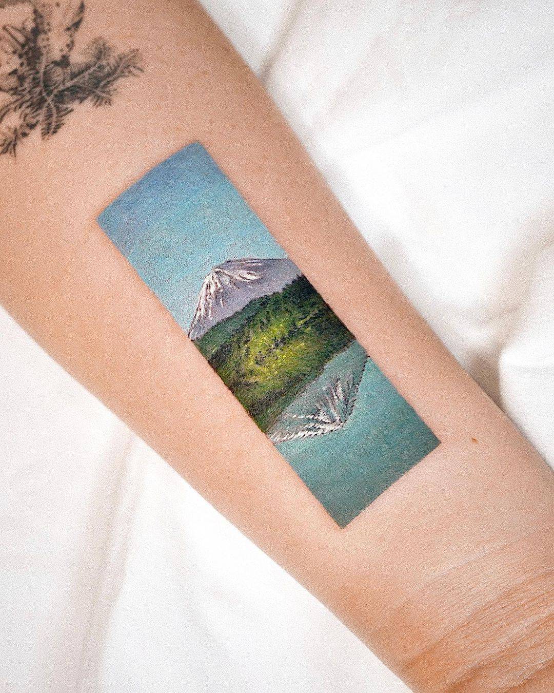 Mountain tattoo design by youngchickentattoo