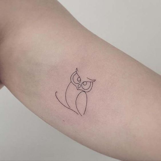 A minimal owl handpoked tattoo featuring moon and sun themes 3rl  5rl  inkofdawn  rSelfTatt