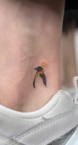 Discover Fun And Lively Tattoo Ideas For Penguin Lovers