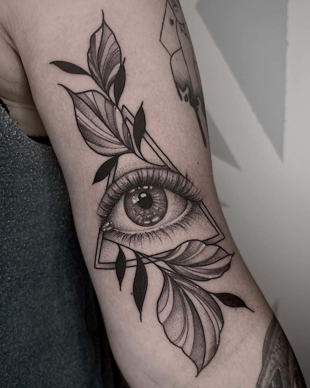 Realistic eye tattoo by brii.fletchtattoos