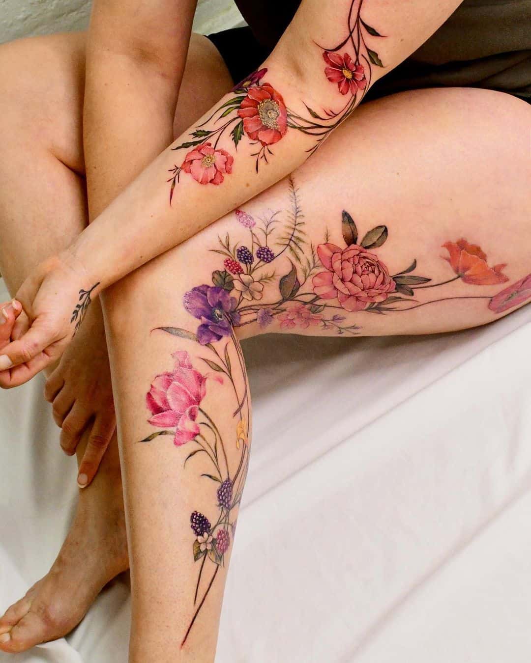 Realistic flower tattoo by yerae tt