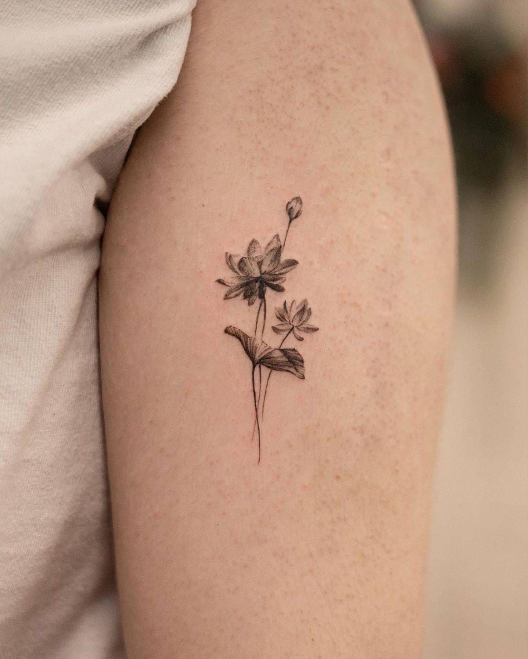 Realistic lotus tattoo by handitrip