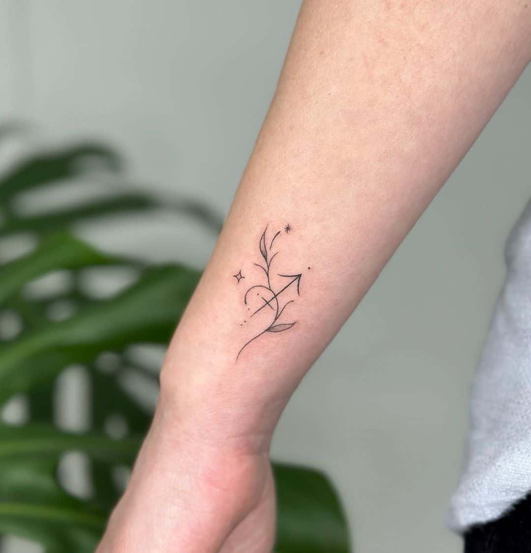 Geometric Arrow & Bow Sagittarius Tattoo Design - Astro Tattoos