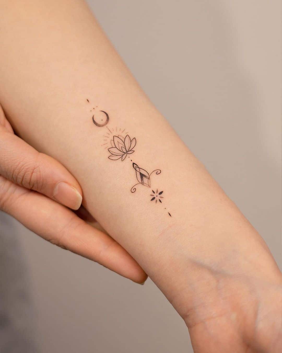 Simple lotus tattoo by handitrip